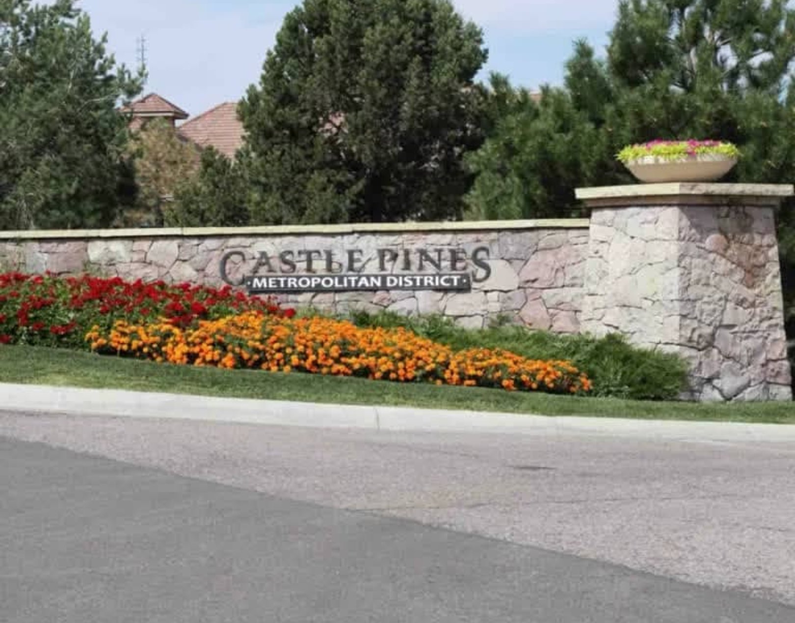 Commercial landscape irrigation system at business entrance in Denver Colorado